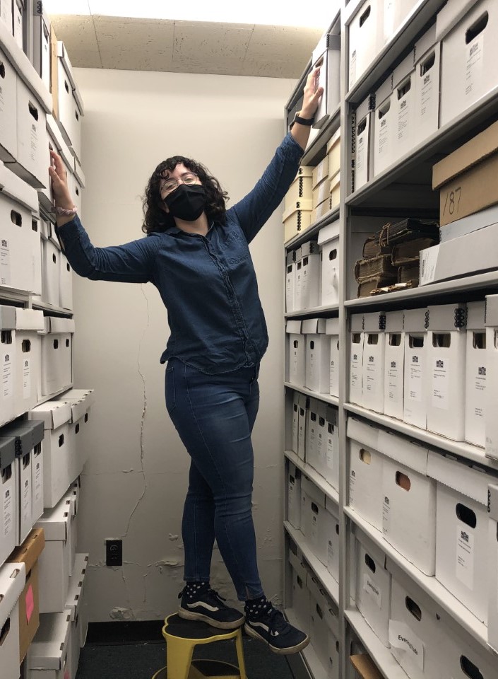 Mary Pedraza, Archives Apprentice, in the Library Annex stacks