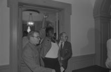 Protester being removed from board meeting