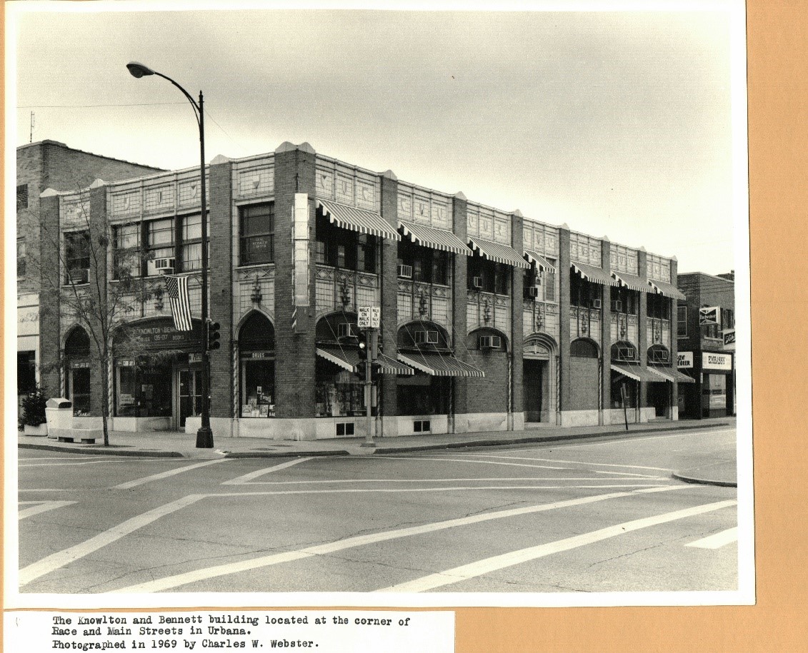 A black and white photograph of the Knowlton and Bennett building after the 1926 renovations. Awnings and decorative elements have been added to the facade.