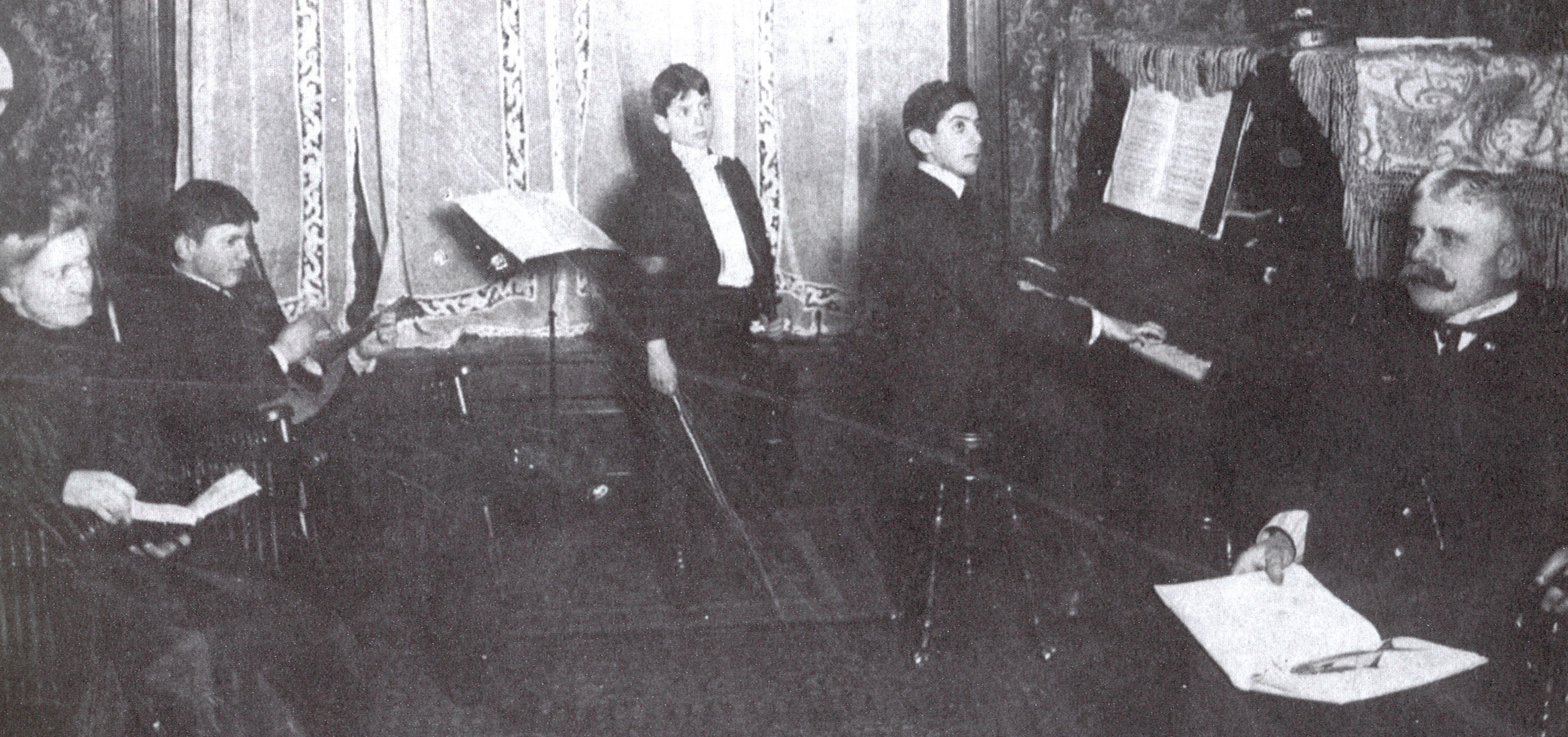 "A musical evening at the Cohen's house circa 1900. 
