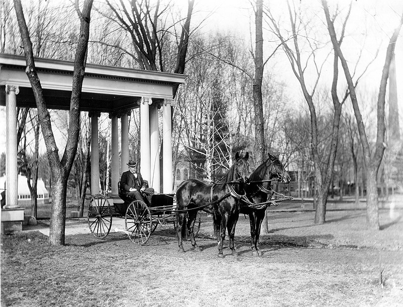 University of Illinois President Andrew S. Draper in a horse and buggy outside of the President’s Residence, 1410 West Green Street, Urbana.