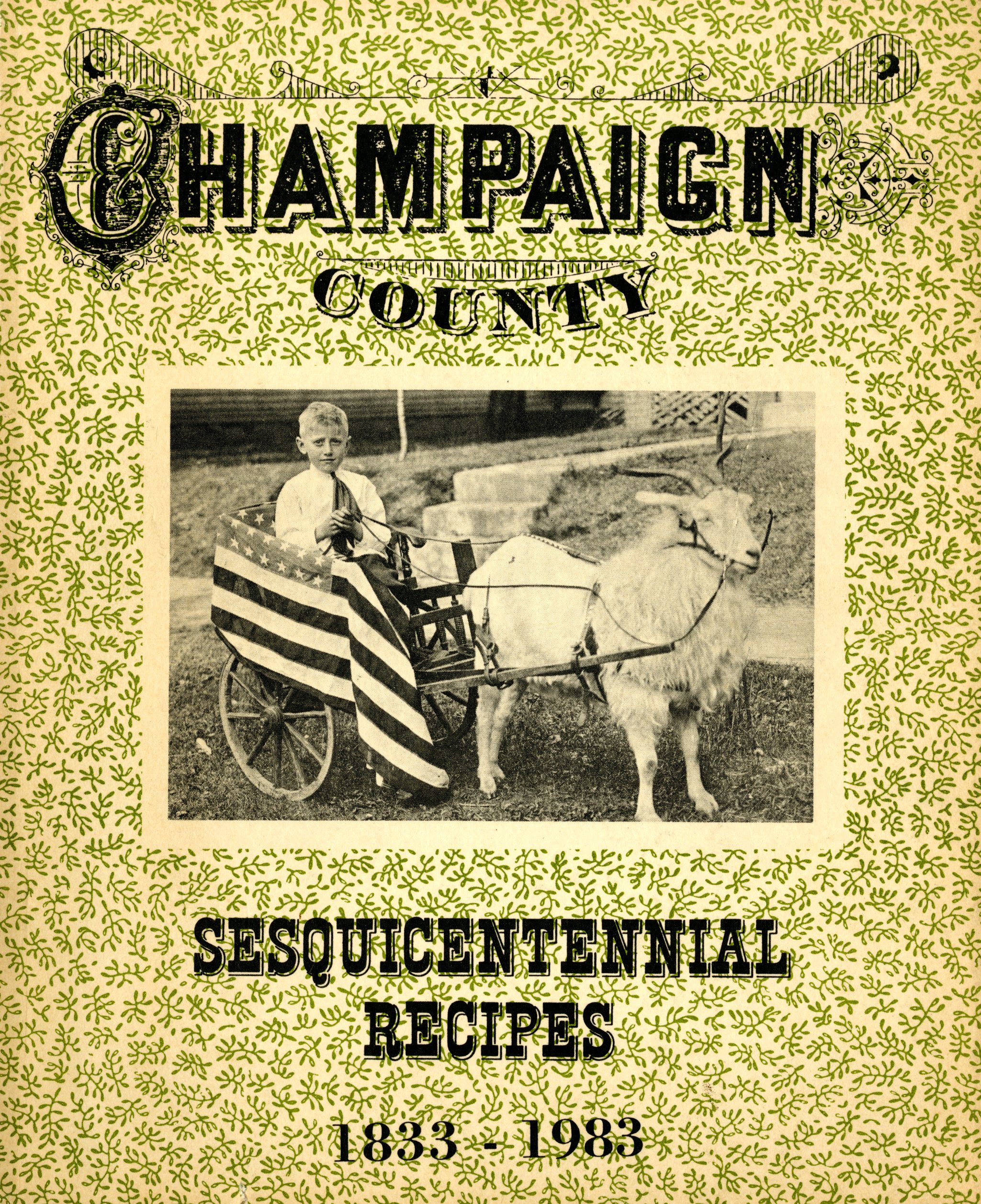 Image of a cover of a cookbook. There is a photograph of a young boy on the cover riding a small chariot draped in a flag being pulled by a goat.