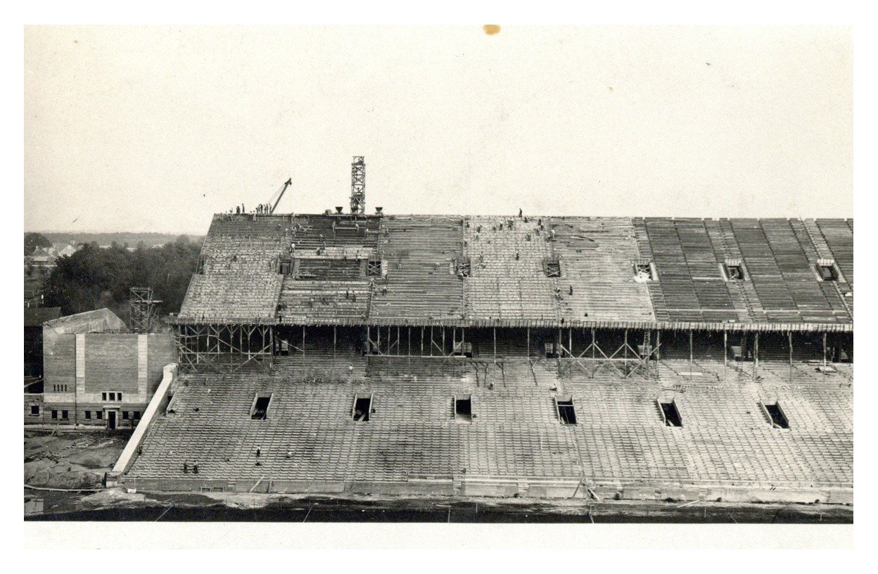 Black and white photograph of the east side of Memorial Stadium under construction.