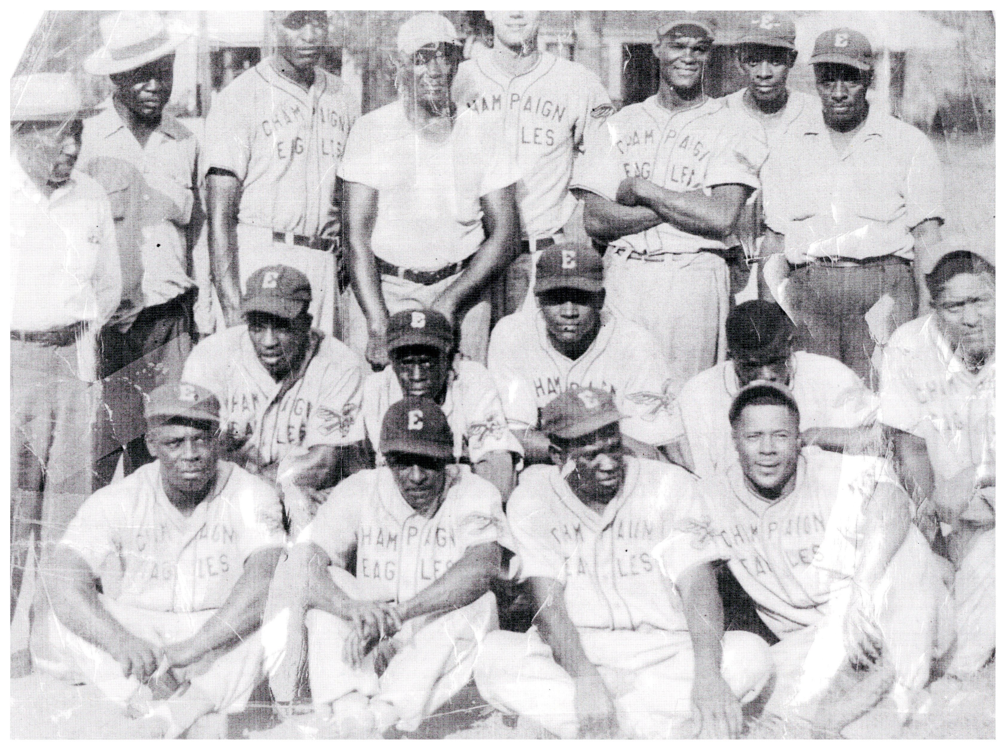 A black and white photocopy of a photograph of the Champaign Eagles, an African American baseball team, taken in the 1950s.