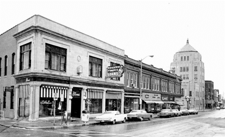 Black and white photograph of Blum's clothing store on Neil St.