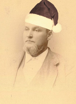 Picture of Frank Jaques in a Santa hat. An image that was cheekily photoshopped by Archives staff. 