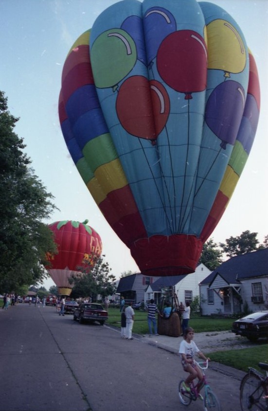 Hot air balloon becalmed on Van Doren St., a residential neighborhood, in Champaign. 