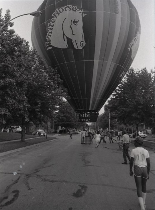 Hot air balloon landing at the intersection of White and Fourth streets in Champaign.