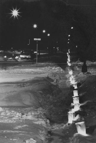 Christmas luminaries lining West Healey Street, Champaign, December 26, 1960.  