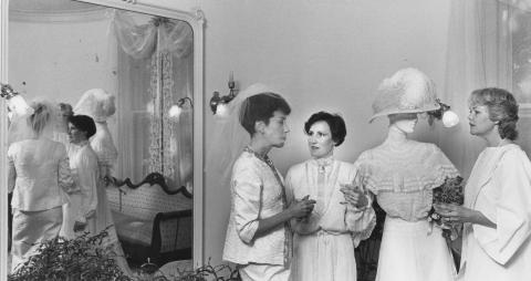 Judy Kaufman, Susan Chalifoux, and Laurie McCarthy with historical wedding gowns at the Wilbur Mansion, 1985