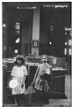 Two children in Ellis Island's Immigration Station, circa 1915