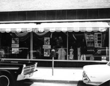 Storefront decorated for 50th anniversary, 1967