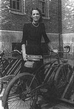 Picture of Mary R. Clemons at Chanute, 1943 posing with a bicycle