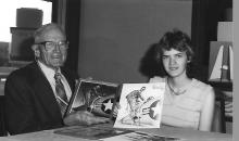 Welk with James Andrews, Andrews holds a photo of herself side-by-side with Welk's drawing