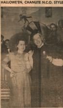 Winners of the costume contest, Mrs. Hill and M. Sgt. R. L. Jackson pose for a photograph. Published in Chanute Field Wings on Friday, October 31, 1941.
